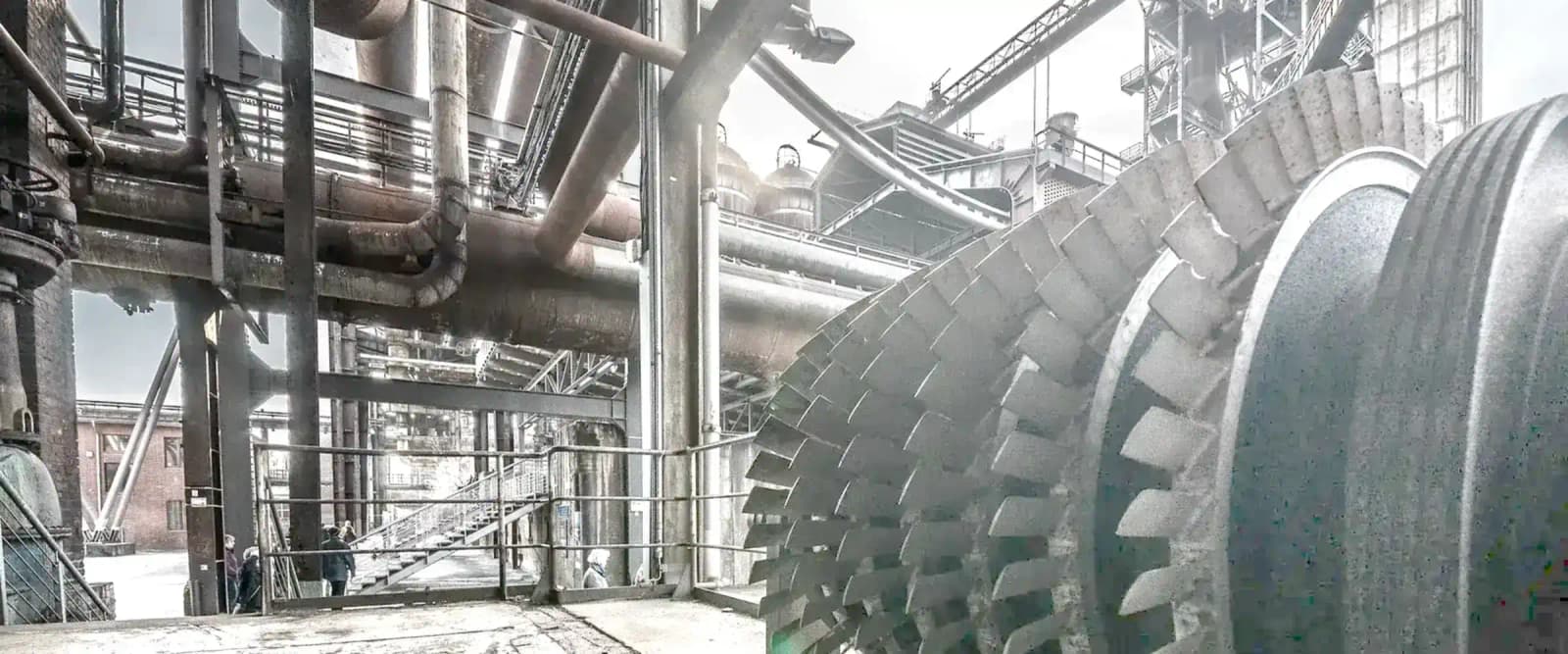 Rolled aluminium coil stock held for inspection